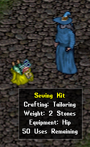 A sewing kit on the ground, with tooltip showing