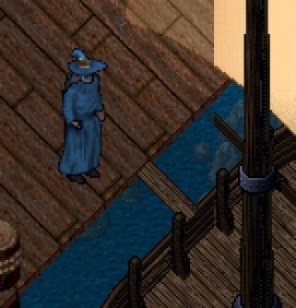A man in front of an open gangplank
